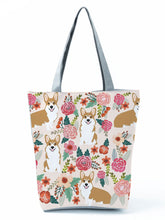 Load image into Gallery viewer, Image of a Corgi handbag in a most adorable Corgi in bloom design