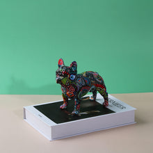 Load image into Gallery viewer, Image of a cutest french bulldog statue standinf on a book in mesmerizing and kaleidoscopic crayon etching design