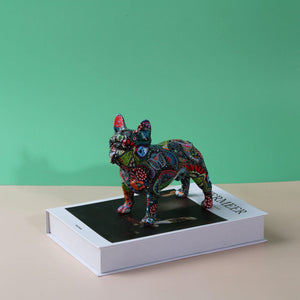 Image of a cutest french bulldog statue standinf on a book in mesmerizing and kaleidoscopic crayon etching design