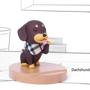 Image of a Dachshund phone stand in smiling Dachshund wearing white scarf design