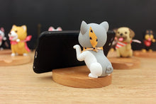 Load image into Gallery viewer, Back image of a grey Husky phone stand in smiling grey Husky wearing yellow scarf design