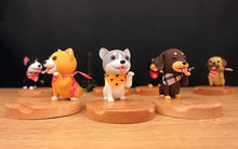 Load image into Gallery viewer, Image of three smiling dog phone stands including Shiba Inu, Husky, and Dachshund wearing scarves design