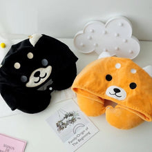 Load image into Gallery viewer, Image of two Shiba Inu travel pillows in orange and black colors lying on a white table