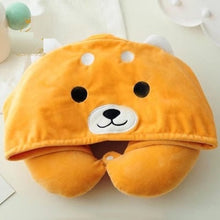 Load image into Gallery viewer, Image of an orange Shiba inu travel pillow and hoodie lying folded on a white platform