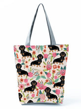 Load image into Gallery viewer, Image of a Dachshund handbag in a most adorable Dachshund in bloom design