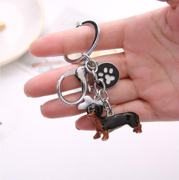 Image of a 3D dachshund keychain made of metal