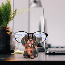 Load image into Gallery viewer, Image of a super cute Dachshund glasses holder placed on the table