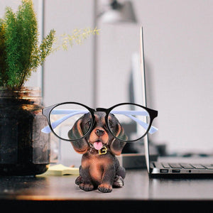 Image of a super cute Dachshund glasses holder placed on the table