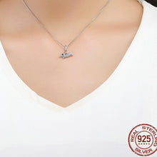 Load image into Gallery viewer, Image of a girl wearing a super-cute studded Dachshund pendant made of 925 Sterling Silver