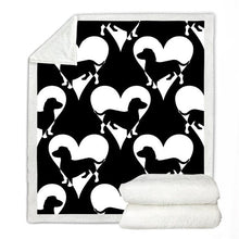 Load image into Gallery viewer, Image of a dachshund blanket with black and white dachshunds and hearts