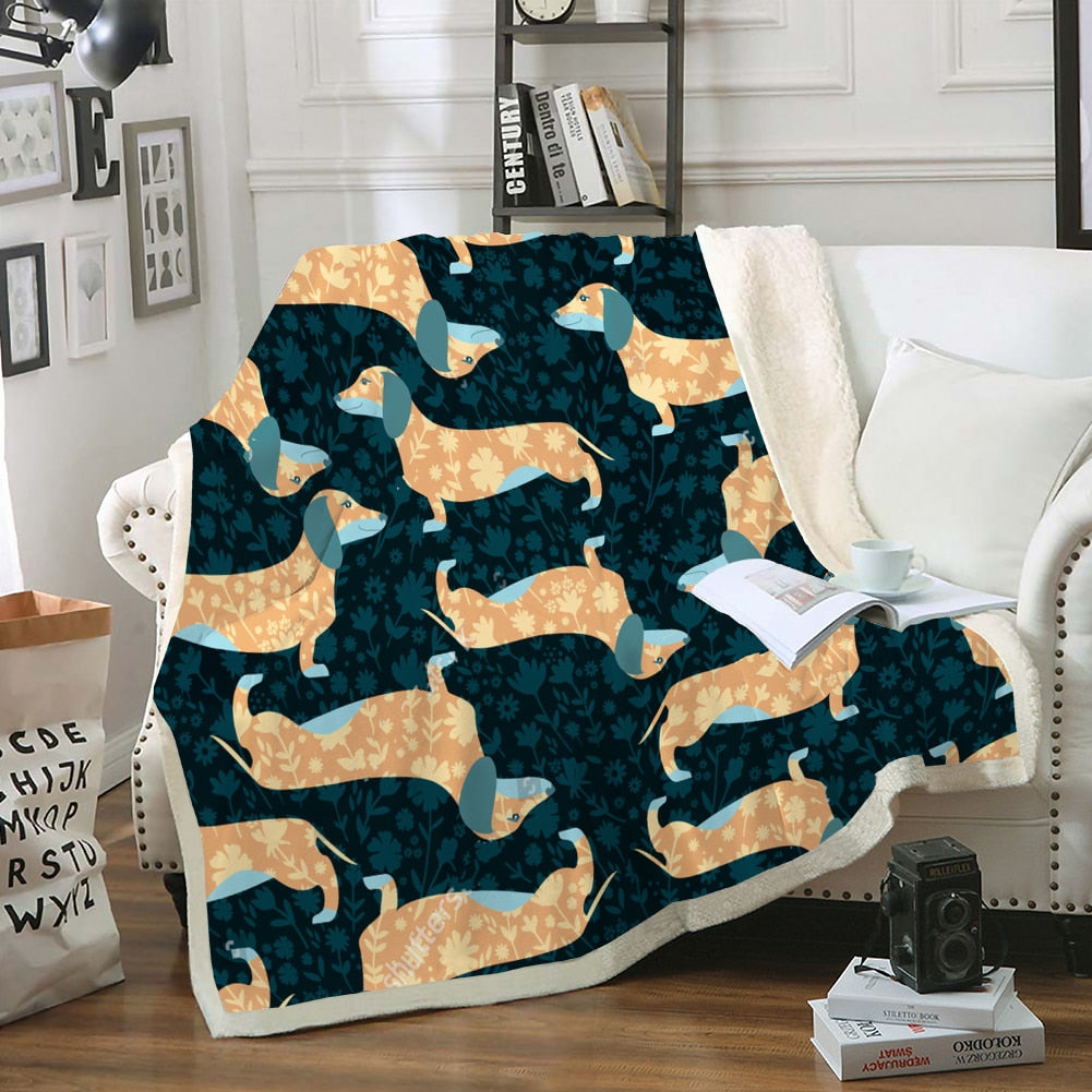 Image of a dachshund plush throw with light orange dachshunds