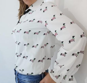 Image of a girl wearing Dachshund blouse shirt in white color with infinite Dachshunds design