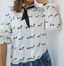 Load image into Gallery viewer, Image of a girl wearing Dachshund shirt in white color with infinite Dachshunds design