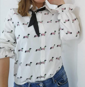 Image of a girl wearing Dachshund shirt in white color with infinite Dachshunds design
