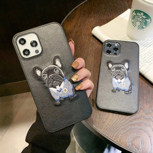 Image of a girl holding black embroidered french bulldog iphone case