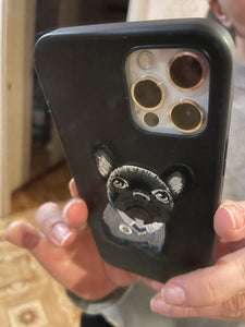 Image of a girl using iphone with french bulldog iphone case