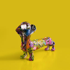 Image of a multicolor extra long dachshund statue in graffiti design