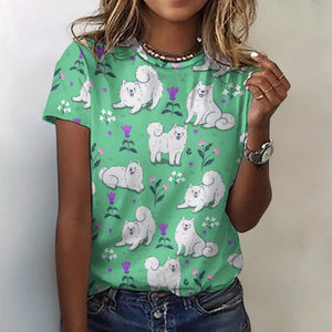 Image of a lady wearing an American Eskimo Dog t-shirt in the color green