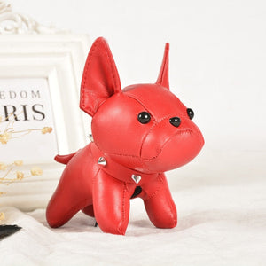 Image of a french bulldog keychain in the color red made of PU leather