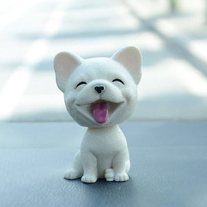 Image of a smiling frenchie bobblehead made of resin