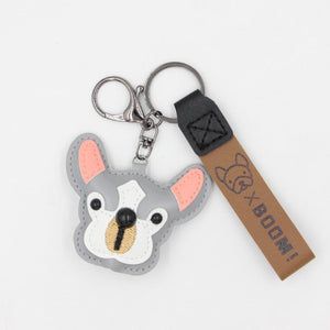 Image of a gray color frenchie keychain with strap made of PU leather