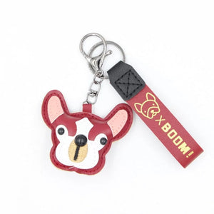 Image of a red color frenchie keychain with strap made of PU leather