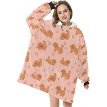 Load image into Gallery viewer, image of a woman wearing a doodle blanket hoodie - peach