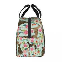 Load image into Gallery viewer, Side image of an insulated green color Greyhound lunch bag with exterior pocket in bloom design