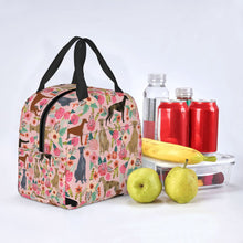 Load image into Gallery viewer, Image of an insulated pink color Greyhound lunch bag with exterior pocket in bloom design