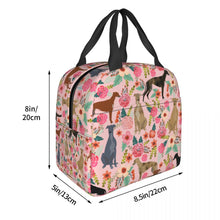 Load image into Gallery viewer, Image of the size of an insulated pink color Whippet bag with exterior pocket in bloom design