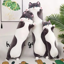 Load image into Gallery viewer, Three plush toys shaped like husky on a decorative surface with plants in the background.