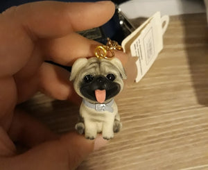 Image of a super cute and smiling Pug keychain