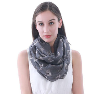 Image of a girl wearing a beautful Shih Tzu scarf in the color dark grey with infinite Shih Tzu design
