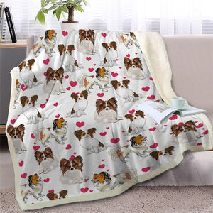 Image of a super cute Papillon blanket in the cutest Papillons with hearts designs