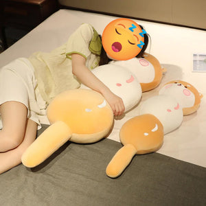 Image of a girl sleeping with two huggable Shiba inu plush pillows
