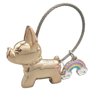 Image of a girl frenchie keychain in the color light gold