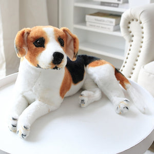 image of an adorable beagle stuffed animal plush toy sleeping on the table