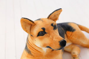image of a lying german shepherd stuffed animal plush toy - closeup