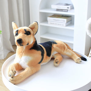 image of a german shepherd stuffed animal plush toy lying on a table