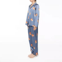 Load image into Gallery viewer, Side image of a girl wearing shiba inu pajama set