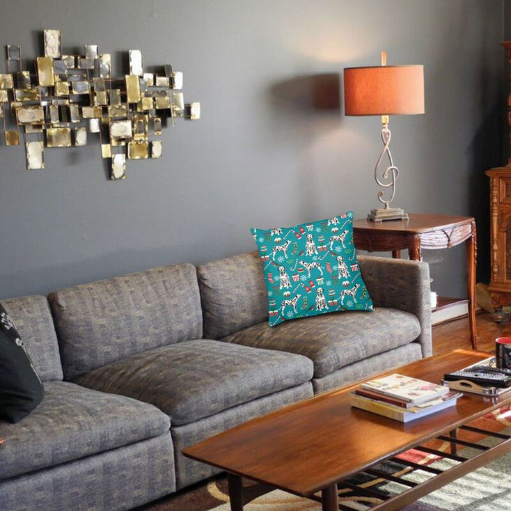 Image of a Dalmatian Cushion Cover kept on the grey color couch in Merry Christmas Dalmatian design