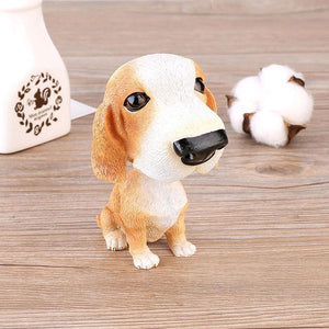 Image of a Basset Hound bobblehead sitting on the floor
