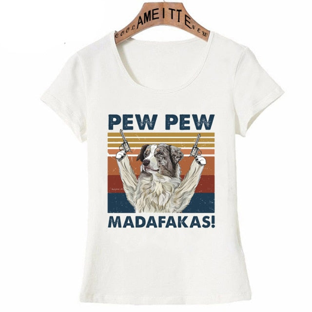 Image of an American Shepherd t-shirt featuring a super-cute American Shepherd with guns in his hands and the text which says 