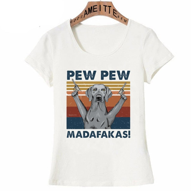 Image of a Weimaraner tshirt featuring a super-cute Weimaraner with guns in his hands and the text which says 