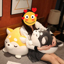 Load image into Gallery viewer, Image of a girl sitting on the bed with her two Husky Stuffed Animal Plush Toy Pillows