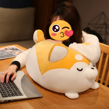 Load image into Gallery viewer, Image of a girl using a Shiba Inu stuffed animal toy pillow as a neck rest