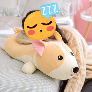 Image of a girl sleeping on a Corgi Plush toy pillow