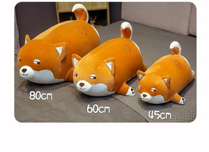 Image of three super cute and realistic stuffed Shiba Inu plush toy pillows in different sizes