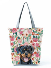 Load image into Gallery viewer, Image of a Rottweiler tote bag in a most adorable Rottweiler in bloom design