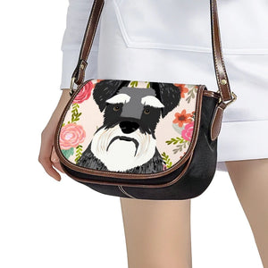 Image of a lady carrying a Schnauzer bag with Schnauzer in bloom design - another view
